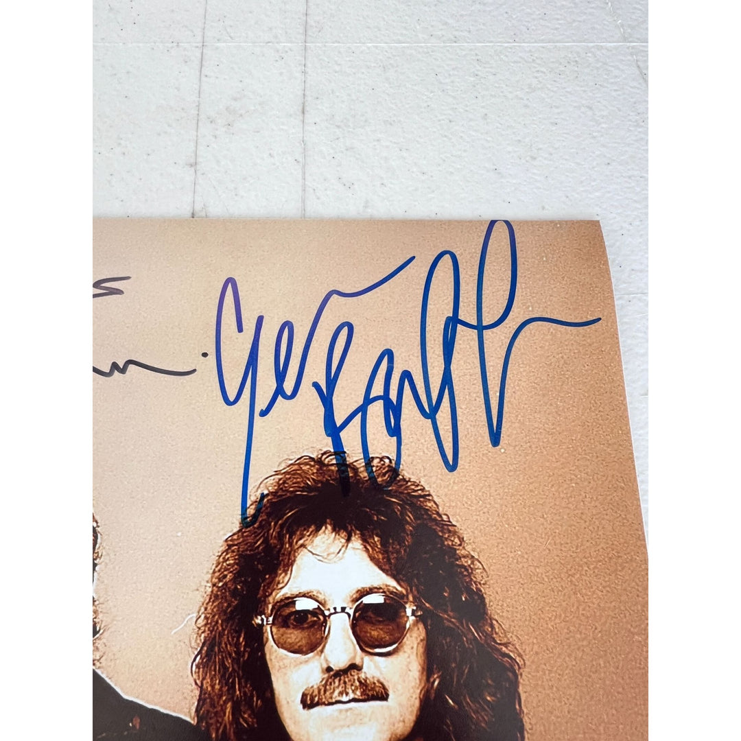 Ozzy Osbourne, Tony Iommi, Geezer Butler, Bill Ward Black Sabath vintage 11x14 photo signed with proof.