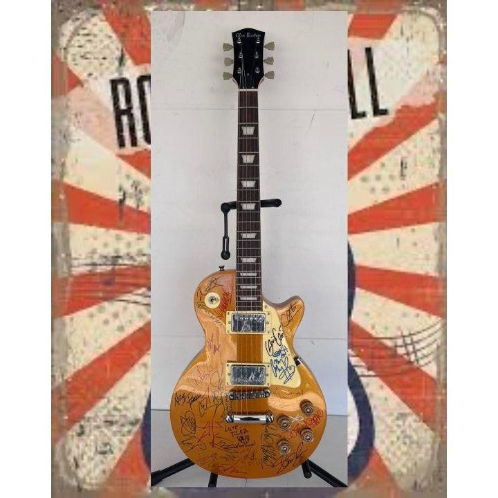 Brian May, Slash, Keith Richards, Ritche Blackmore, Ace Freehly 22 greatest guitarists vintage full size les paul electric guitar signed.