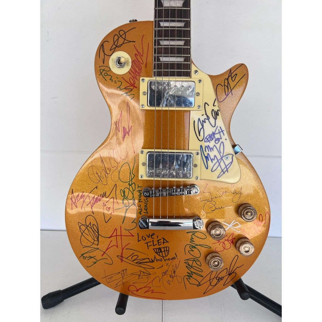 Brian May, Slash, Keith Richards, Ritche Blackmore, Ace Freehly 22 greatest guitarists vintage full size les paul electric guitar signed.