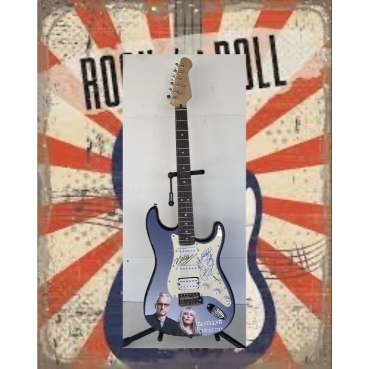 Pat Benatar and Neil Giraldo.(one of a kind) stratocaster full size electric guitar signed with proof $2995.