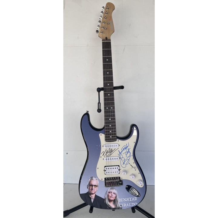 Pat Benatar and Neil Giraldo.(one of a kind) stratocaster full size electric guitar signed with proof $2995.