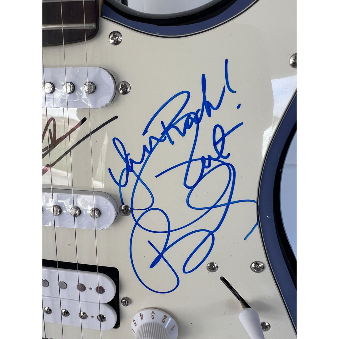 Pat Benatar and Neil Giraldo.(one of a kind) stratocaster full size electric guitar signed with proof $2995.