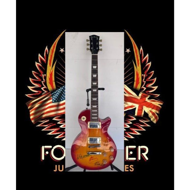 Lou Gramm, Dennis Elliott, Al Greenwood, Ian McDonald, Mick Jones, and Rick Wills vintage Les Paul full size electric guitar signed.