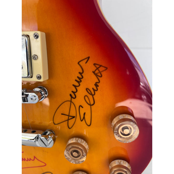 Lou Gramm, Dennis Elliott, Al Greenwood, Ian McDonald, Mick Jones, and Rick Wills vintage Les Paul full size electric guitar signed.