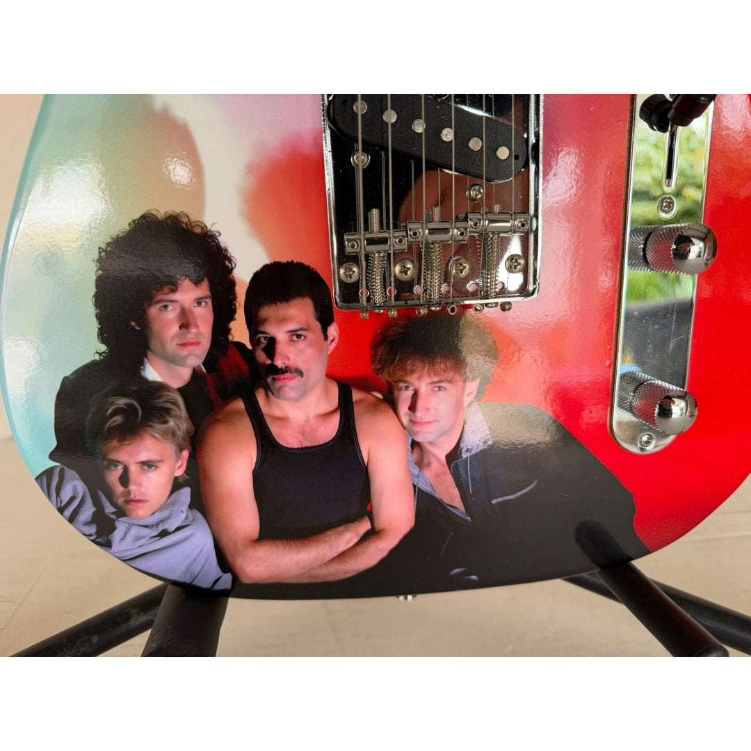 Queen Freddie Mercury, Brian May, Roger Taylor, John Deacon one-of-a kind Telecaster electric guitar signed with proof.