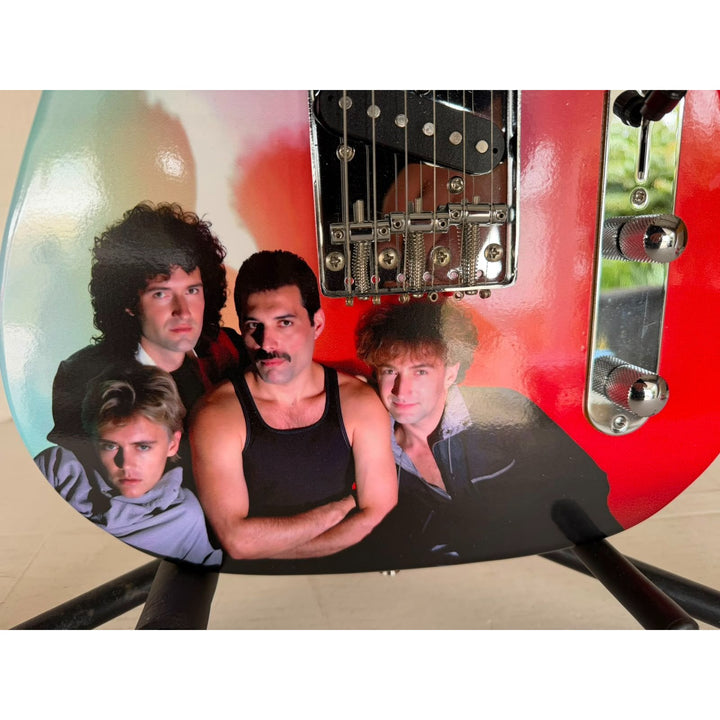 Queen Freddie Mercury, Brian May, Roger Taylor, John Deacon one-of-a kind Telecaster electric guitar signed with proof.