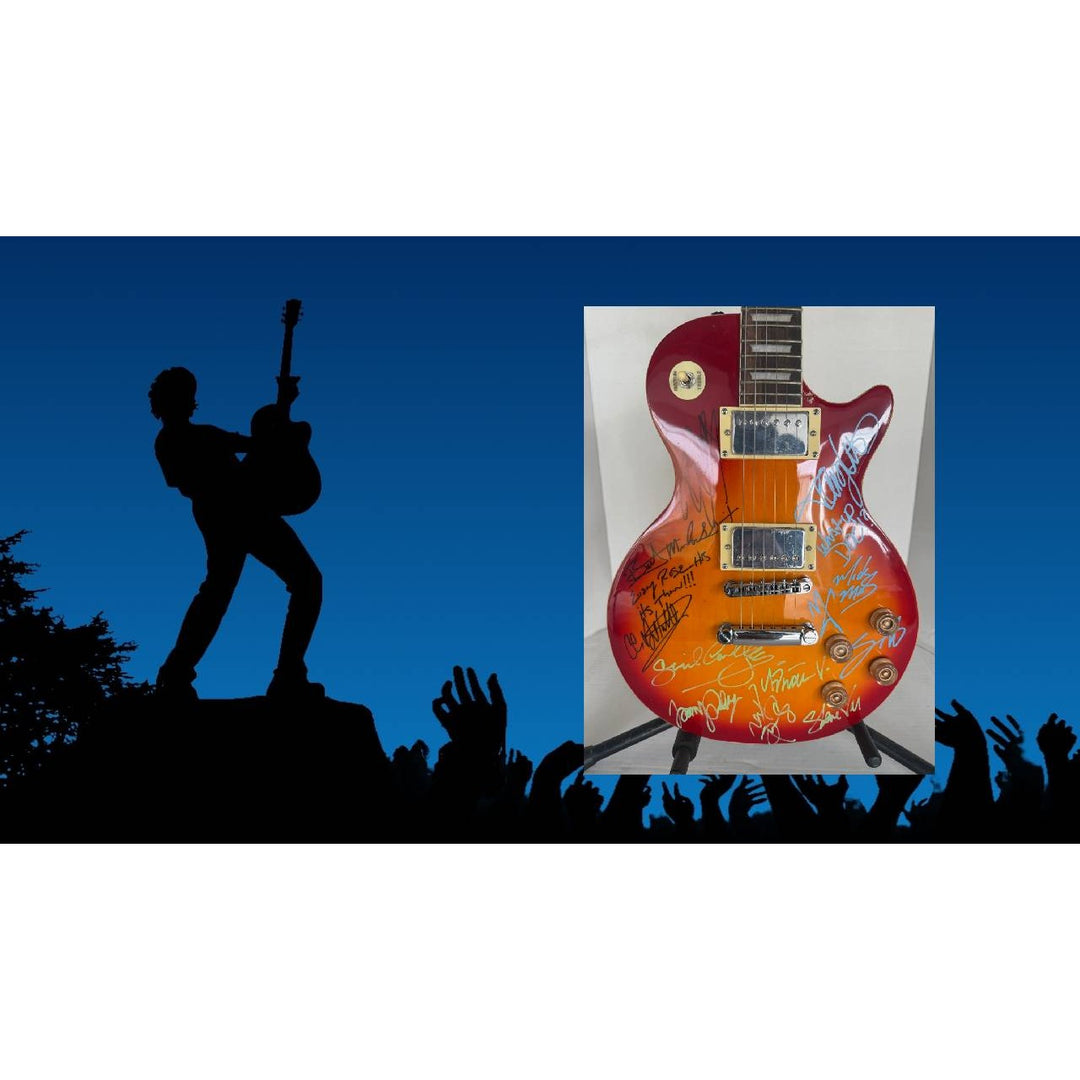 Motley Crue Mick Mars Tommy Lee, Vince Neal Nikki Sixx Poison Brett Michaels, Whitesnake David Coverdale Steve Vai Cherry les paul guitar.