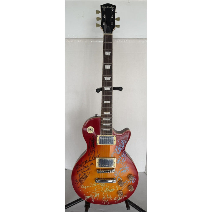 Motley Crue Mick Mars Tommy Lee, Vince Neal Nikki Sixx Poison Brett Michaels, Whitesnake David Coverdale Steve Vai Cherry les paul guitar.