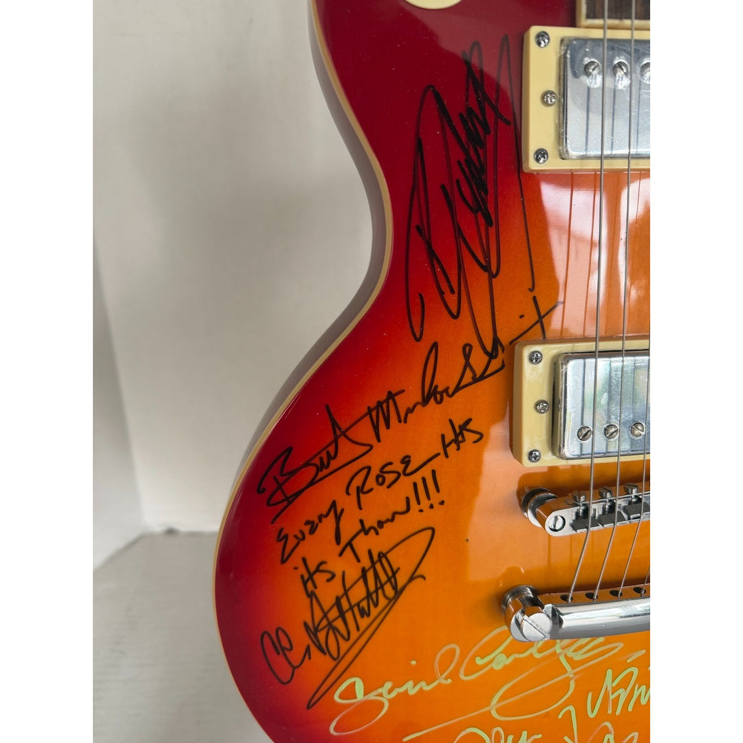 Motley Crue Mick Mars Tommy Lee, Vince Neal Nikki Sixx Poison Brett Michaels, Whitesnake David Coverdale Steve Vai Cherry les paul guitar.