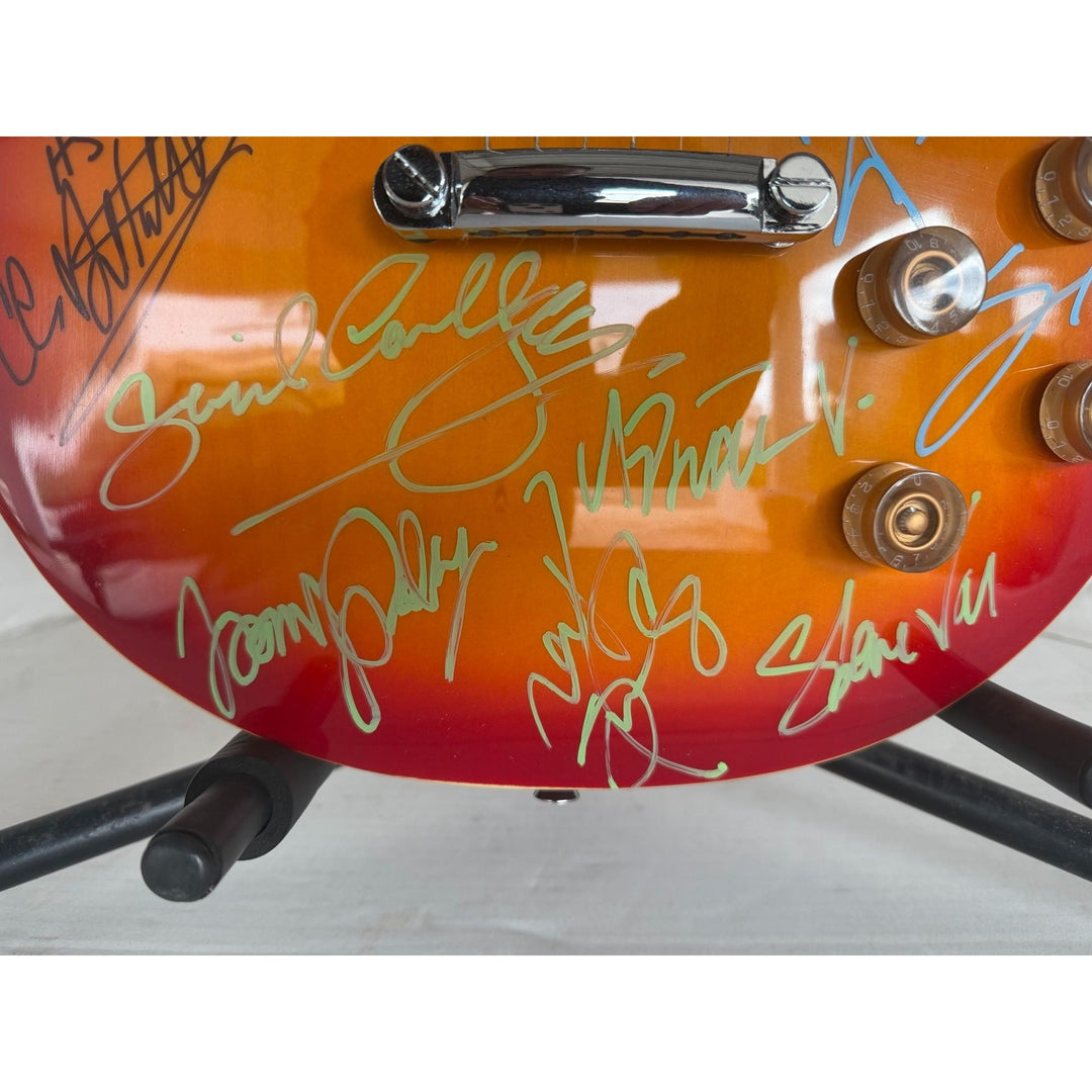 Motley Crue Mick Mars Tommy Lee, Vince Neal Nikki Sixx Poison Brett Michaels, Whitesnake David Coverdale Steve Vai Cherry les paul guitar.
