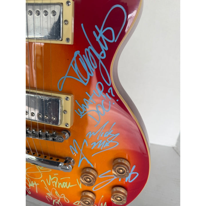 Motley Crue Mick Mars Tommy Lee, Vince Neal Nikki Sixx Poison Brett Michaels, Whitesnake David Coverdale Steve Vai Cherry les paul guitar.