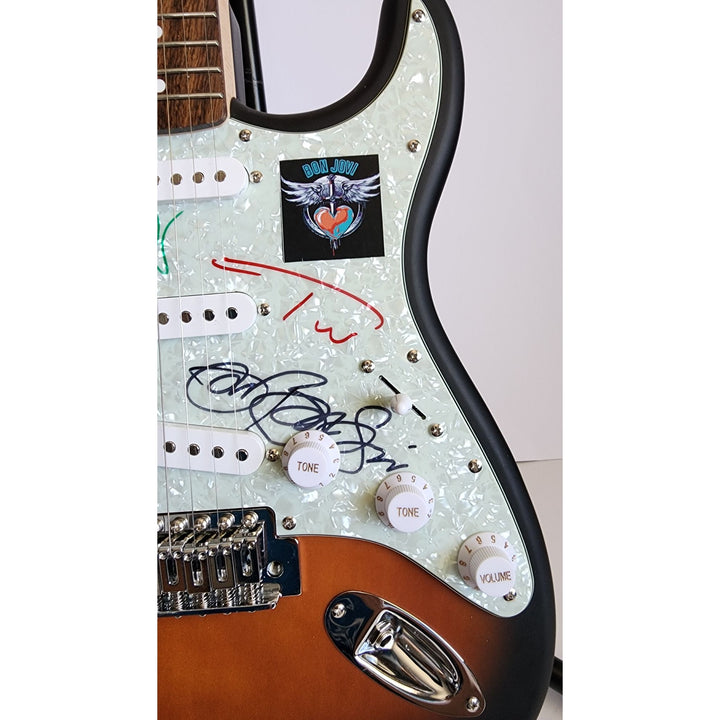 Jon Bon Jovi, Richie Sambora, Tico Torres, David Bryan authentic Fender Stratocaster electric guitar signed with proof