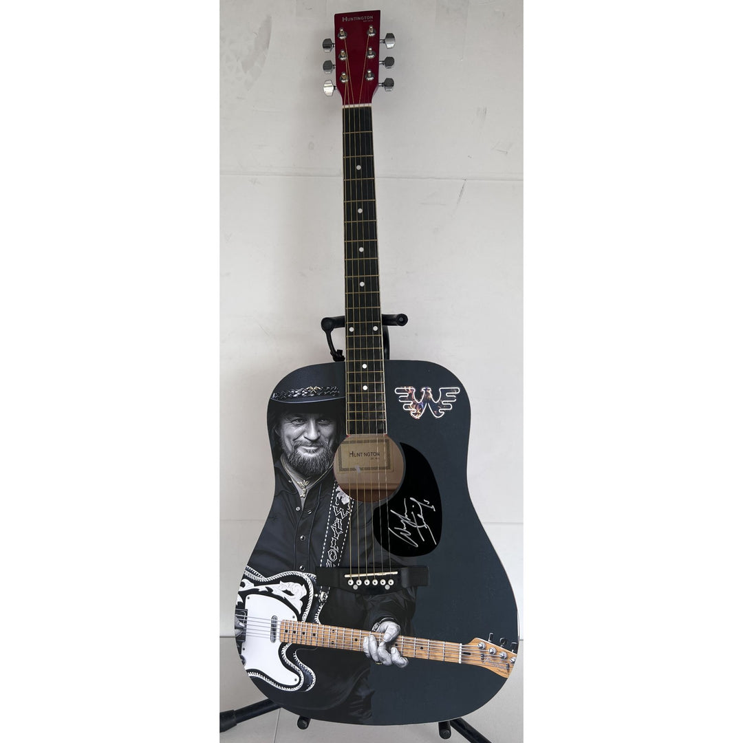 Waylon Jennings  one of a kind full size acoustic guitar signed with poof.