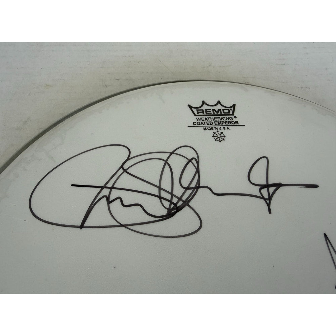 Kiss, Gene Simmons, Paul Stanley, Peter Chris, Ace Frehley one-of-a-kind drumhead signed with proof.