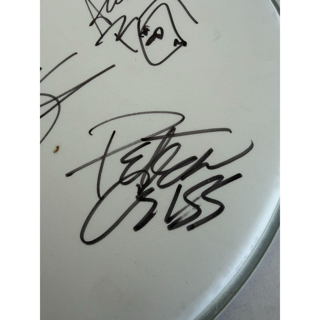 Kiss, Gene Simmons, Paul Stanley, Peter Chris, Ace Frehley one-of-a-kind drumhead signed with proof.