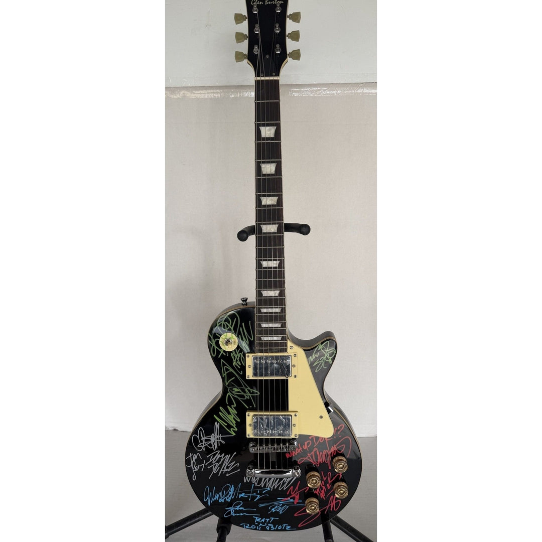 Dokken, Ratt, Motley Crue, Quiet Riot les paul electric guitar signed with proof.