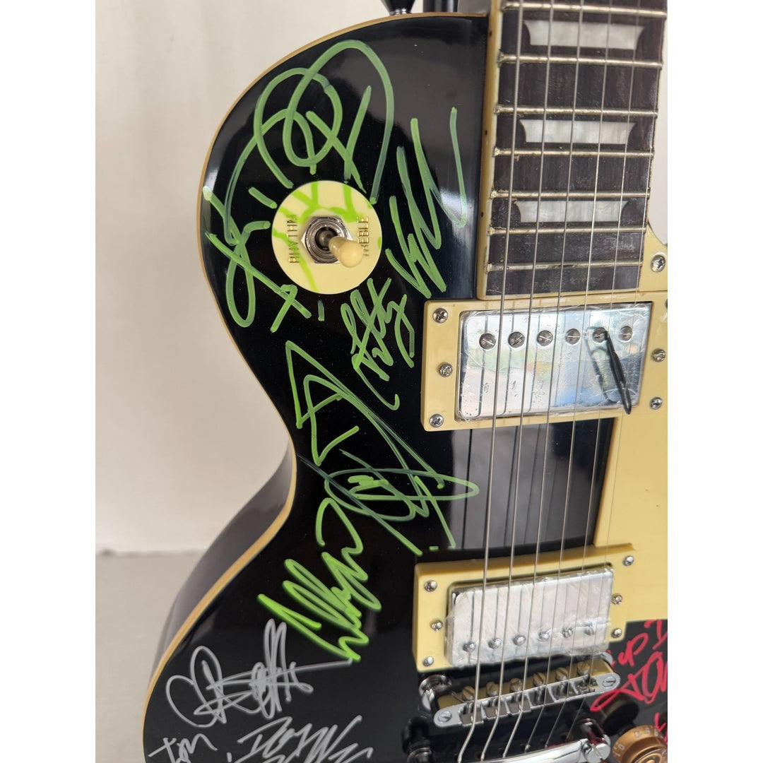 Dokken, Ratt, Motley Crue, Quiet Riot les paul electric guitar signed with proof.