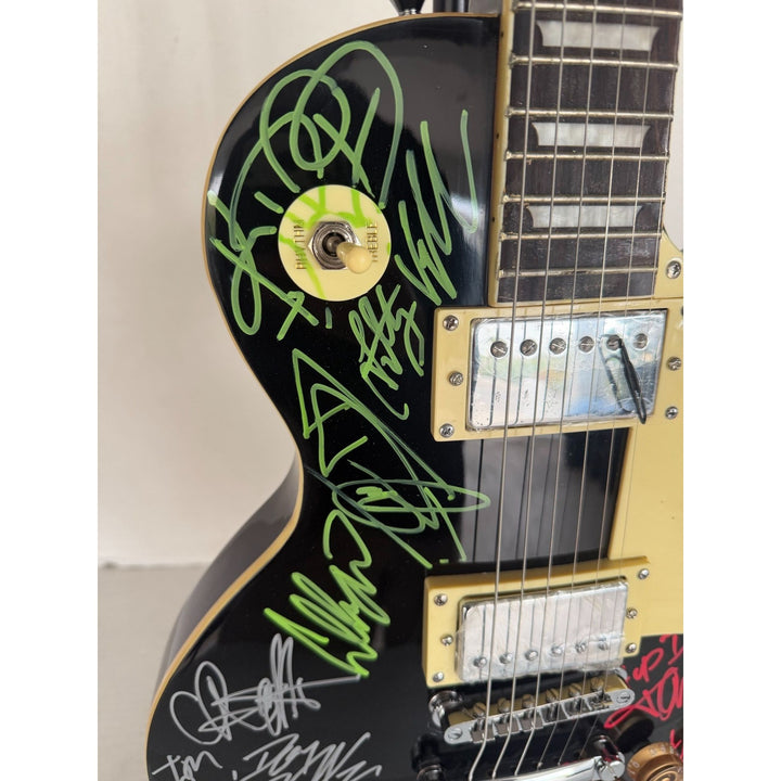 Dokken, Ratt, Motley Crue, Quiet Riot les paul electric guitar signed with proof.