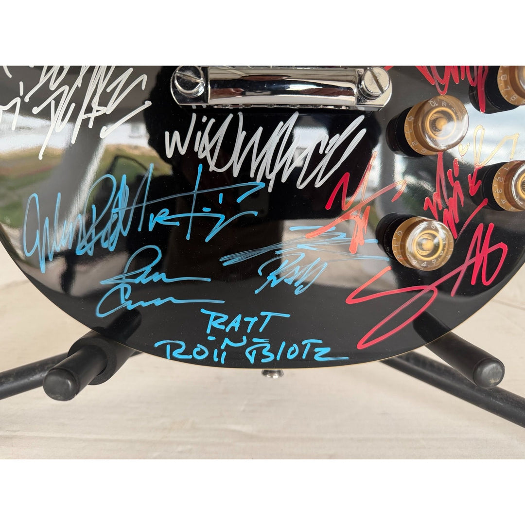 Dokken, Ratt, Motley Crue, Quiet Riot les paul electric guitar signed with proof.