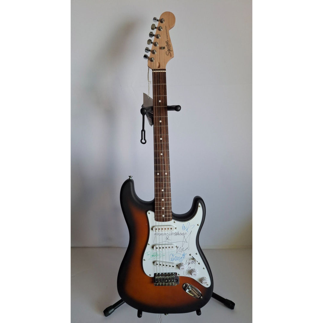 Michael Hutchence, Jon, Andrew, Tim Farriss, Garry Gary Beers, INXS Fender Stratocaster full size electric guitar signed with proof