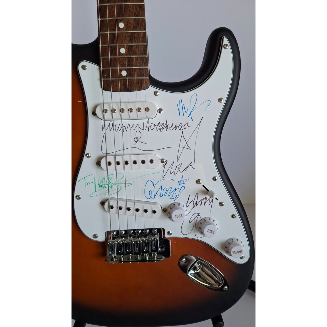 Michael Hutchence, Jon, Andrew, Tim Farriss, Garry Gary Beers, INXS Fender Stratocaster full size electric guitar signed with proof
