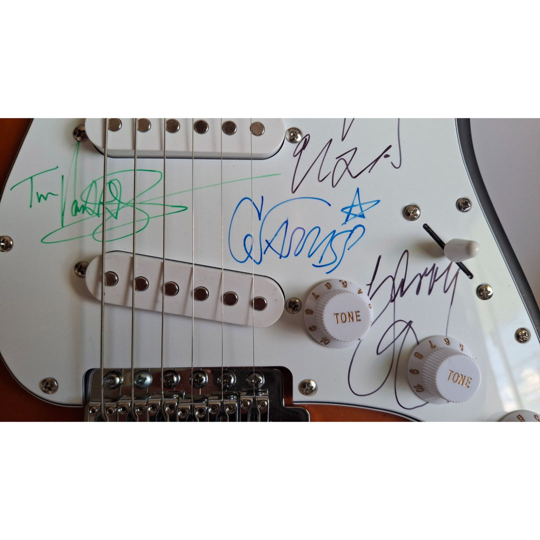 Michael Hutchence, Jon, Andrew, Tim Farriss, Garry Gary Beers, INXS Fender Stratocaster full size electric guitar signed with proof