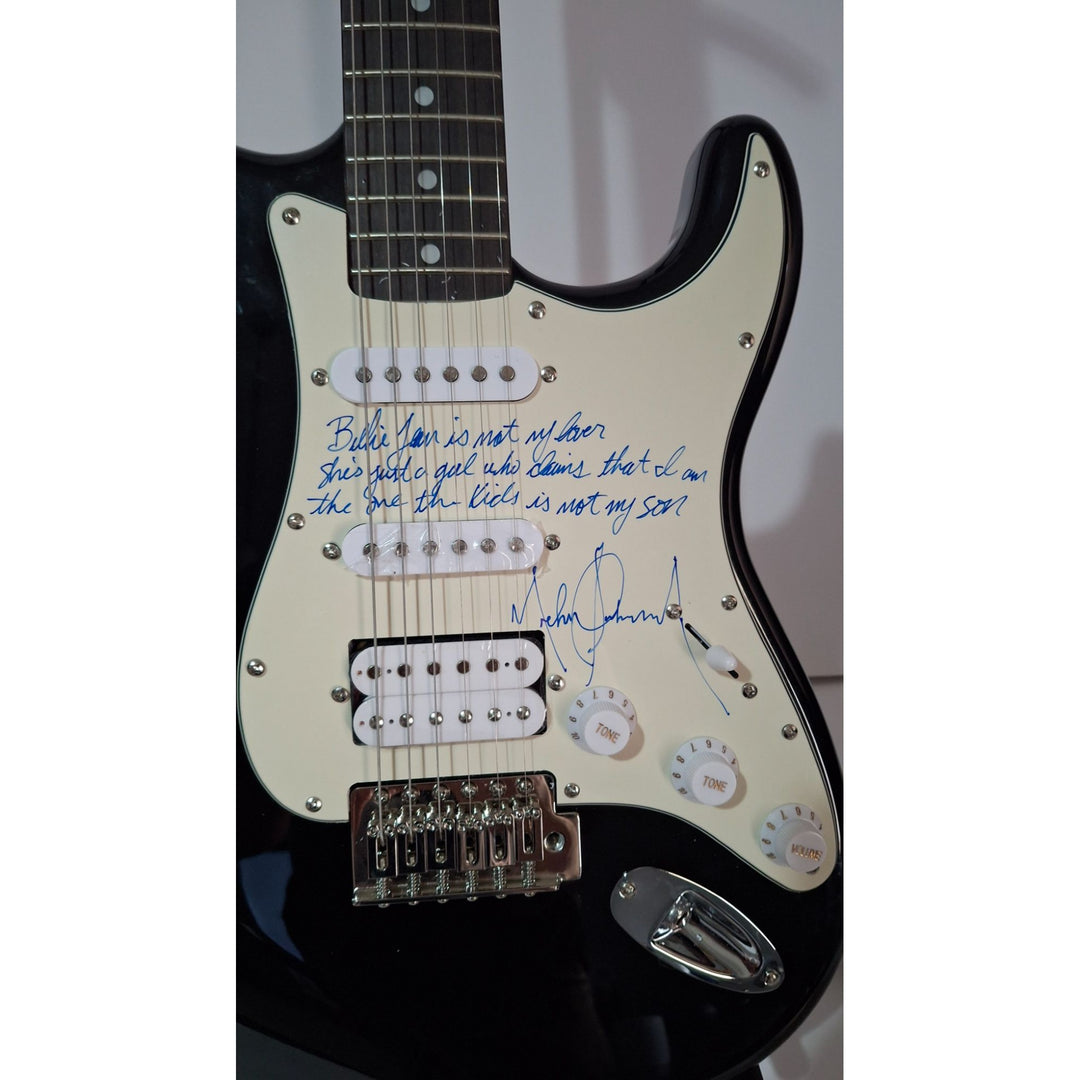 Michael Jackson incredible piece signed with lyrics to "BIlly Jean" on a Fender Stratocaster electric guitar signed with proof
