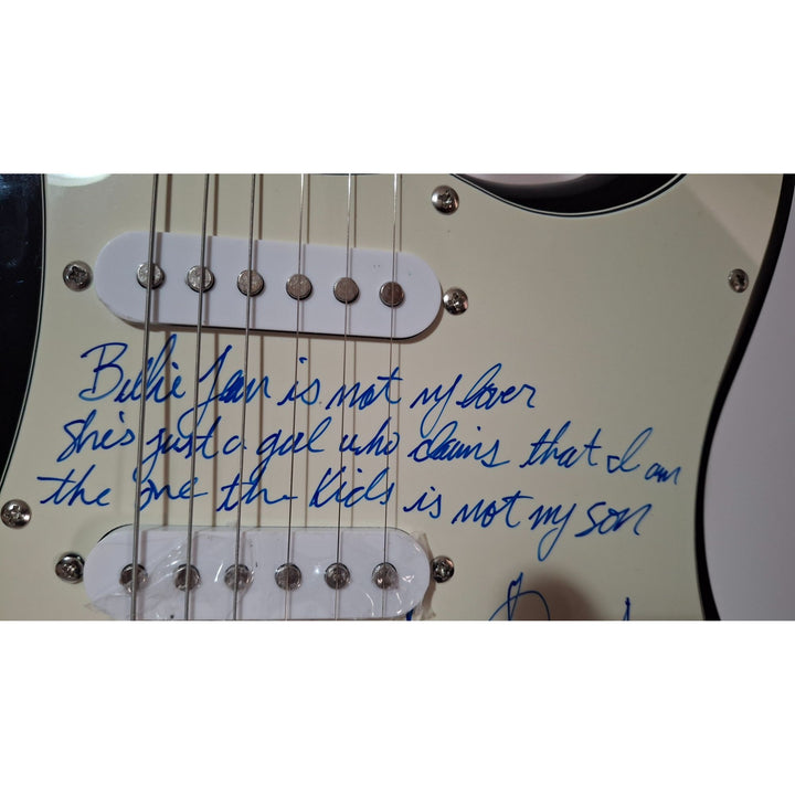 Michael Jackson incredible piece signed with lyrics to "BIlly Jean" on a Fender Stratocaster electric guitar signed with proof