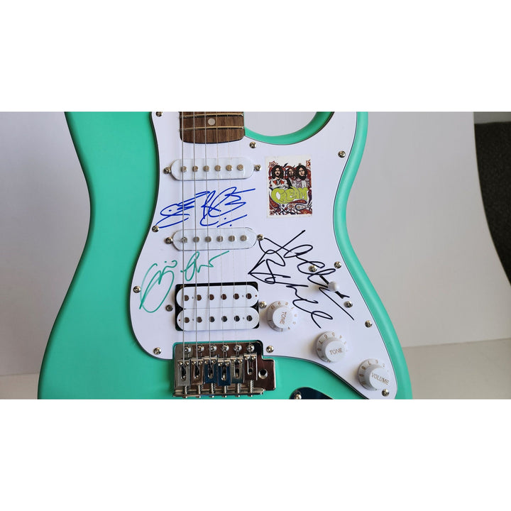 Cream Eric Clapton, Ginger Baker, Jack Bruce Fender Stratocaster electric guitar signed with proof