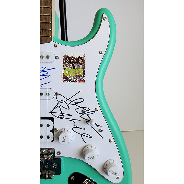 Cream Eric Clapton, Ginger Baker, Jack Bruce Fender Stratocaster electric guitar signed with proof