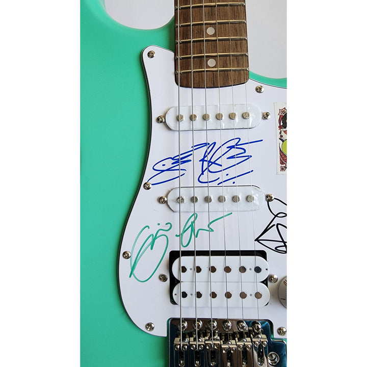 Cream Eric Clapton, Ginger Baker, Jack Bruce Fender Stratocaster electric guitar signed with proof