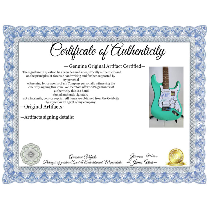 Cream Eric Clapton, Ginger Baker, Jack Bruce Fender Stratocaster electric guitar signed with proof