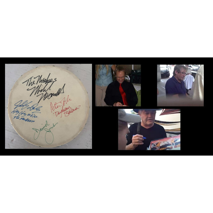 The Monkees signed with inscriptions Michael Nesmith, Davey Jones Mickey Dolenz Peter York Tambourine 8" signed with proof.