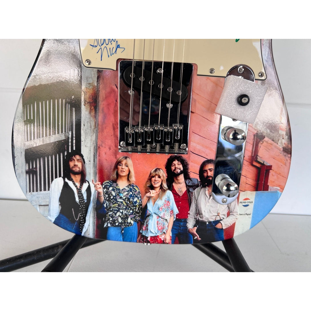 Fleetwood Mac  signed by Mick Fleetwood  Christine McVie, John McVie, Stevie Nicks and Lindsey Buckingham telecaster electric guitar signed.