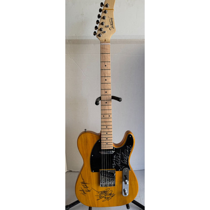 The Highwaymen Johnny Cash Kris Kristofferson Willie Nelson Waylon Jennings full Telecaster electric guitar signed with proof.