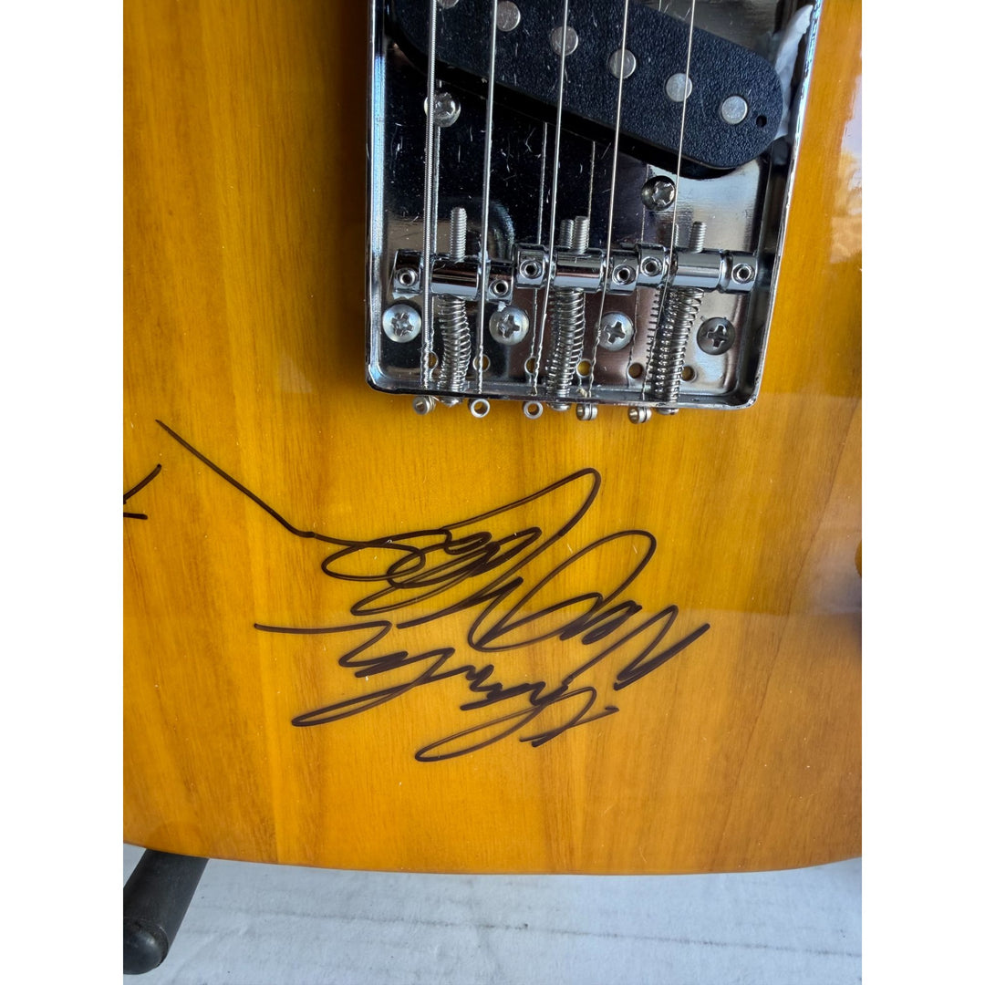 The Highwaymen Johnny Cash Kris Kristofferson Willie Nelson Waylon Jennings full Telecaster electric guitar signed with proof.