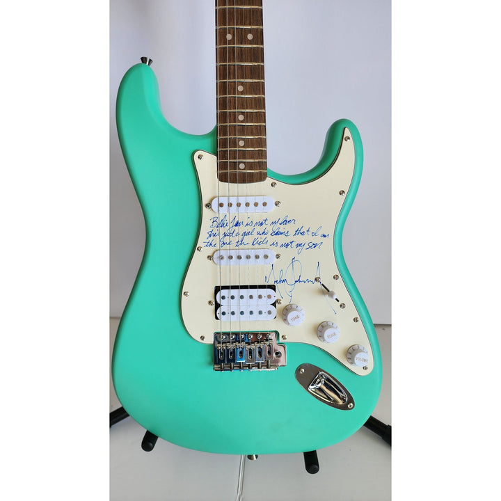 MJ - Michael Jackson incredible piece signed with lyrics to "BIlly Jean" on a Fender Stratocaster electric guitar signed with proof