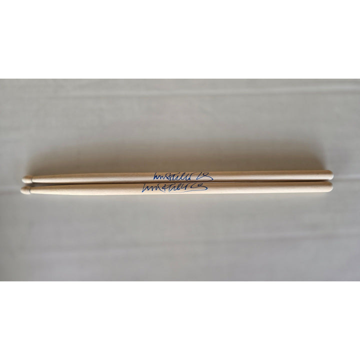 Phil Collins legendary drummer Genesis pair of drumsticks signed with proof.