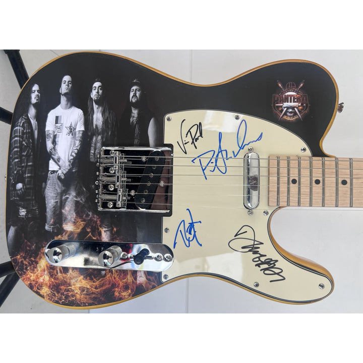 Pantera Phil Anselmo, Dimebag Darrell Abbott, Rex Brown, and Vinnie Paul electric guitar signed with proof.