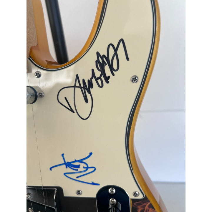 Pantera Phil Anselmo, Dimebag Darrell Abbott, Rex Brown, and Vinnie Paul electric guitar signed with proof.