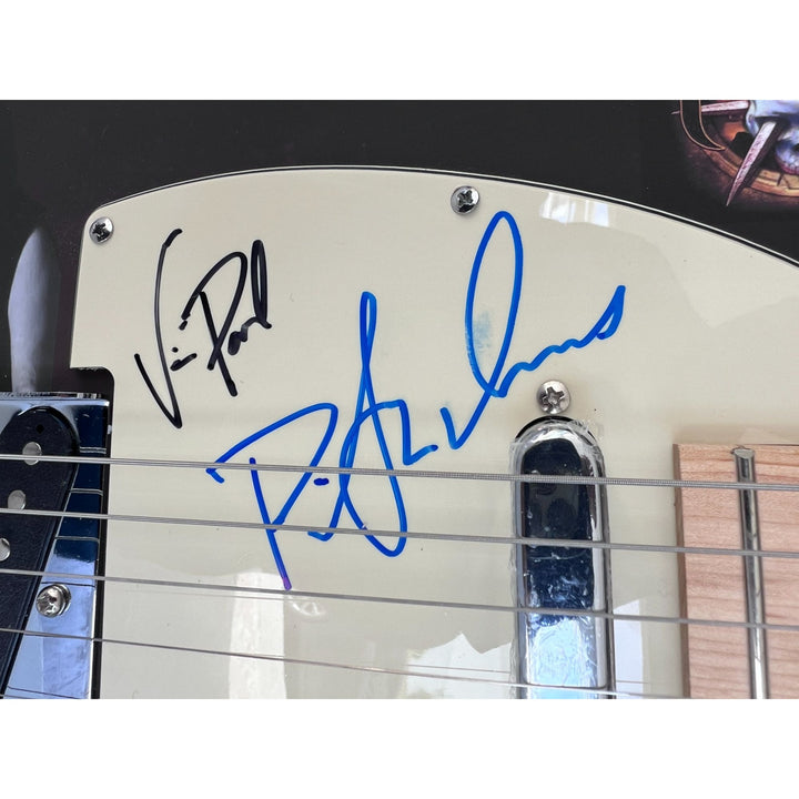 Pantera Phil Anselmo, Dimebag Darrell Abbott, Rex Brown, and Vinnie Paul electric guitar signed with proof.