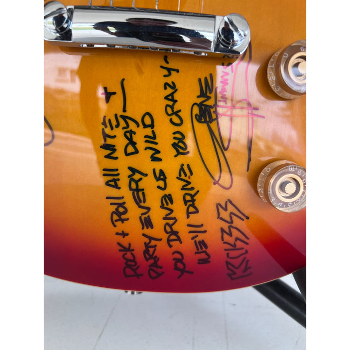 Kiss vintage les paul Gene Simmons Paul Stanley Ace Freehly and Peter Criss signed with proof and inscriptions.