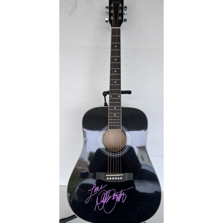 Dolly Parton full size acoustic guitar signed with proof.