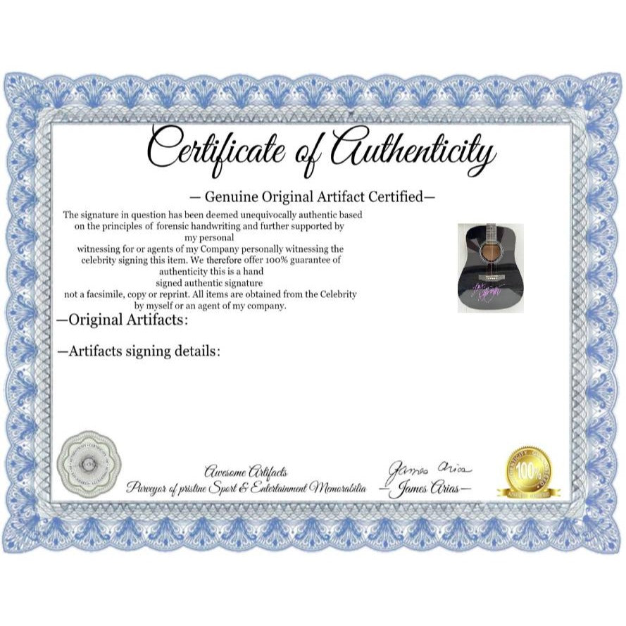 Dolly Parton full size acoustic guitar signed with proof.
