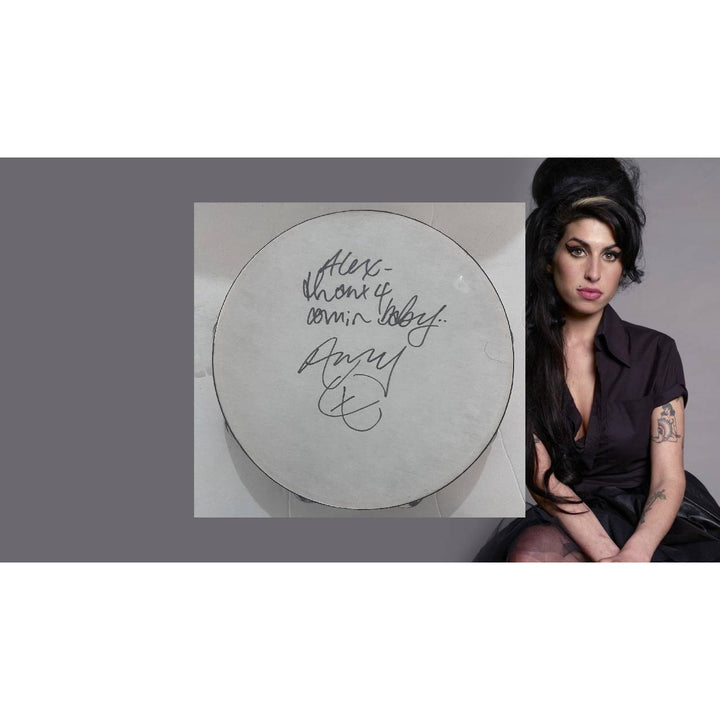 Amy Winehouse 10' tambourine signed with inscription and proof