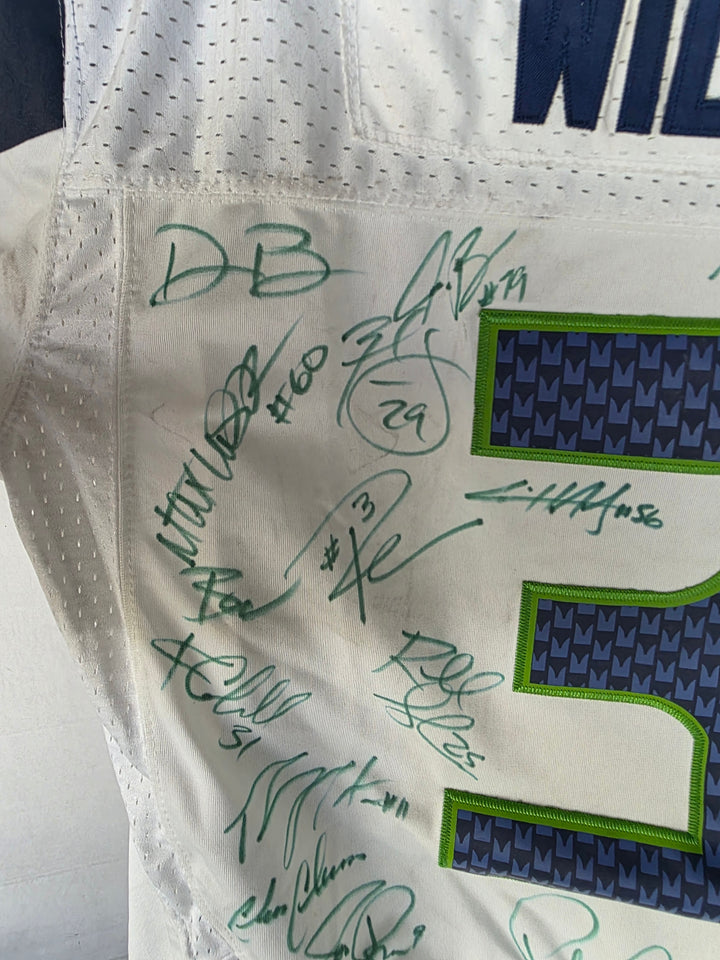 Seattle Seahawks team signatures close-up 1