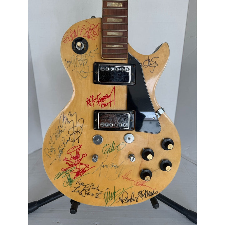 1970s Encore E49 Les Paul Custom 15 iconic guitarists signed with proof.