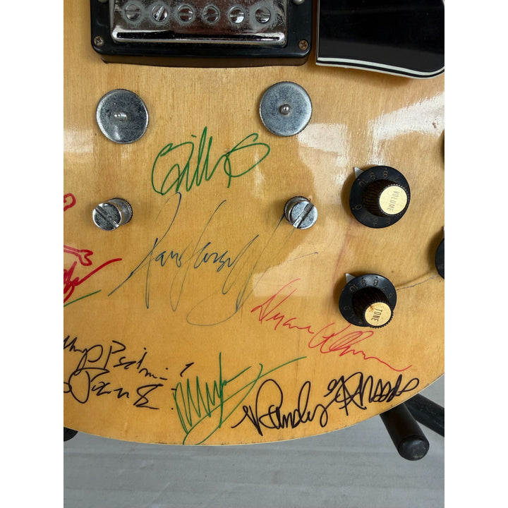 1970s Encore E49 Les Paul Custom 15 iconic guitarists signed with proof.