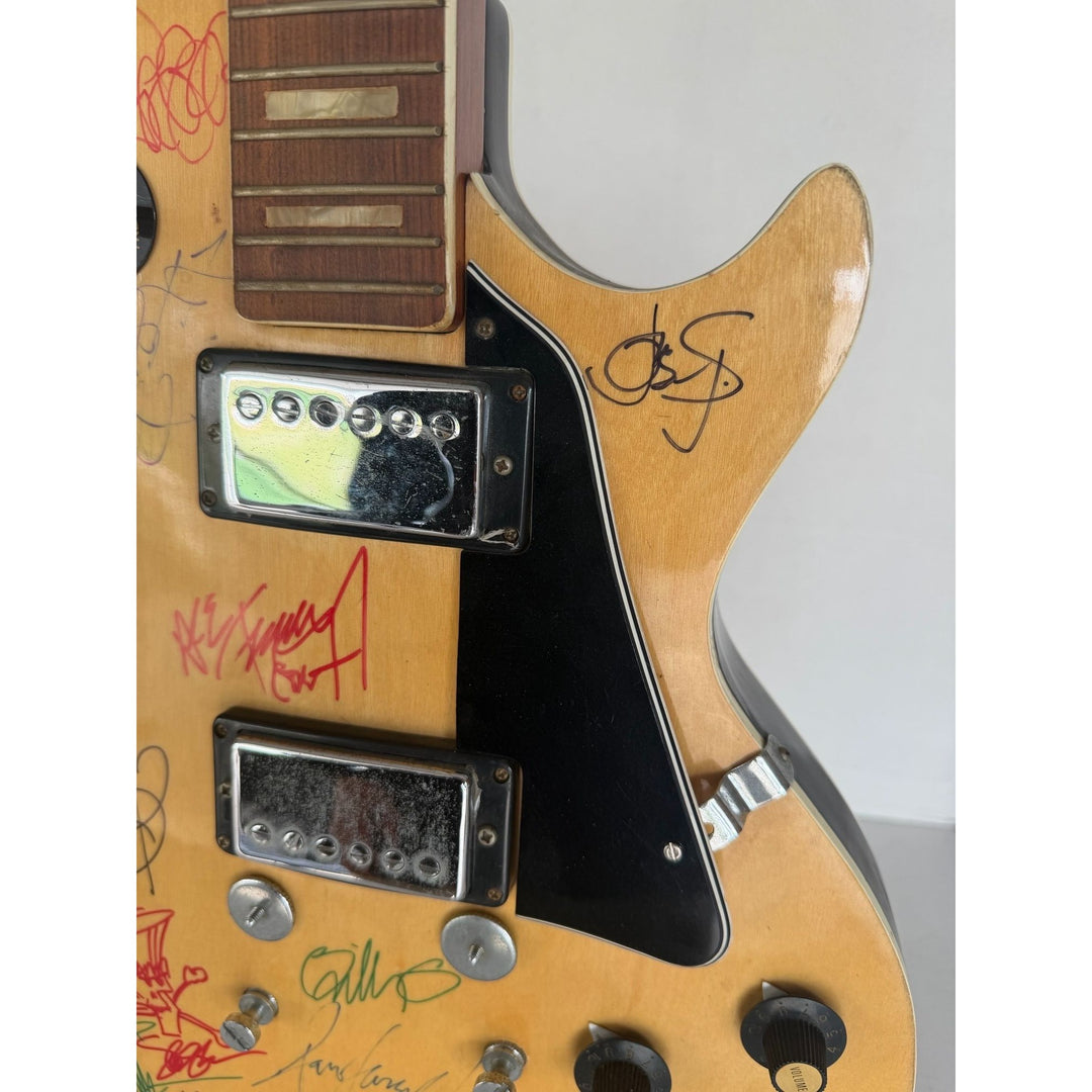 1970s Encore E49 Les Paul Custom 15 iconic guitarists signed with proof.
