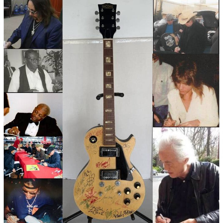 1970s Encore E49 Les Paul Custom 15 iconic guitarists signed with proof.